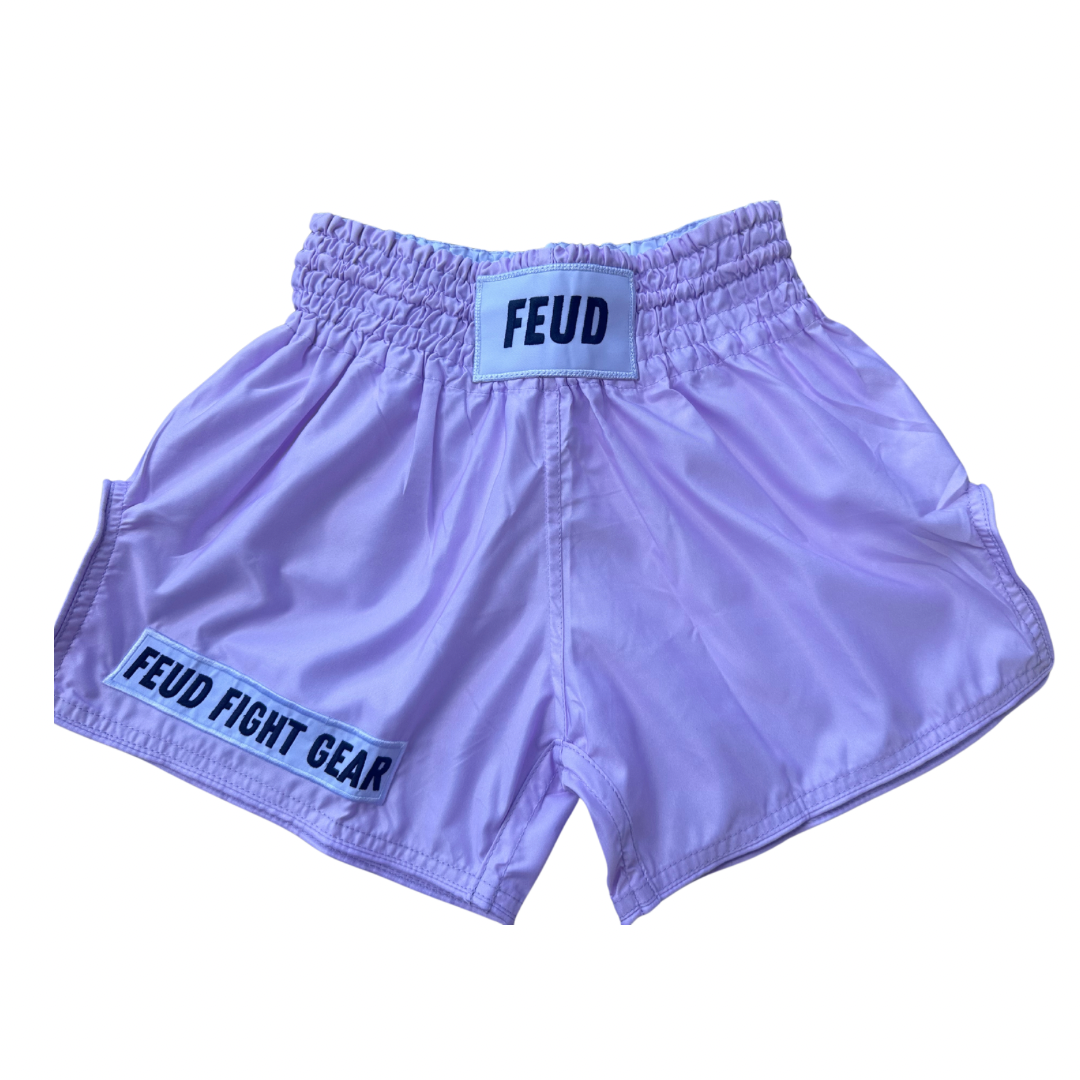 Lilac Muay Thai shorts on white background