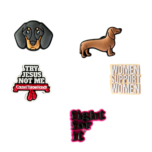 Collection of Muay Thai-inspired Croc charms, including boxing glove and sayings