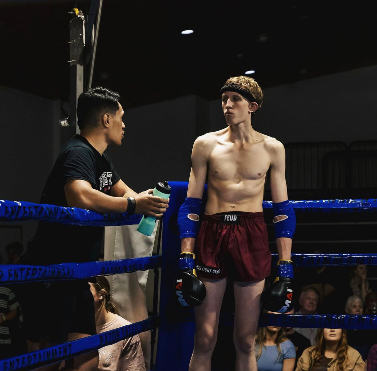 Male fighter wearing Burgundy Thai Shorts