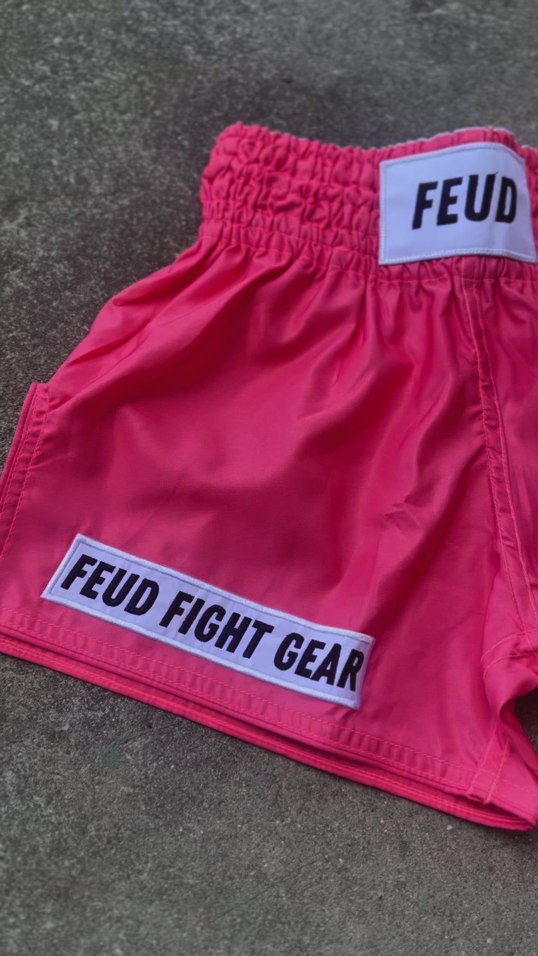 Muay Thai shorts for men and women. Coral pink in colour. Custom thai shorts are available for personalised with your name. Australian brand.