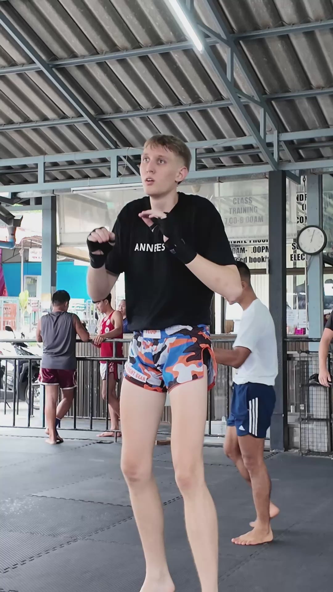 Video of Muay Thai training in Orange Blue Camo Shorts