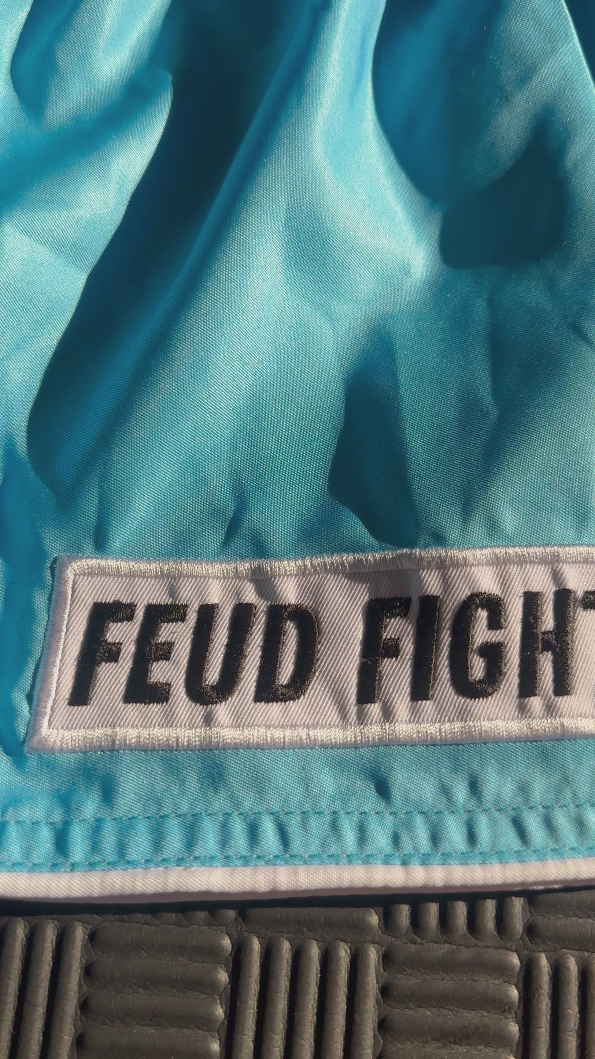 Video showing Muay Thai shorts in light ocean blue colour.