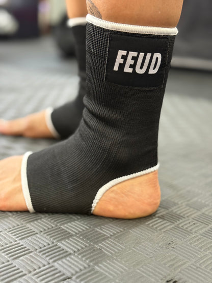 Feud fight gear logo on black ankle guards for Muay Thai training 