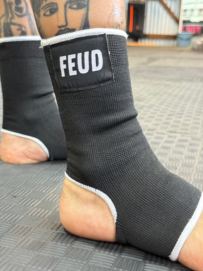 Muay Thai ankle guards with feud logo 