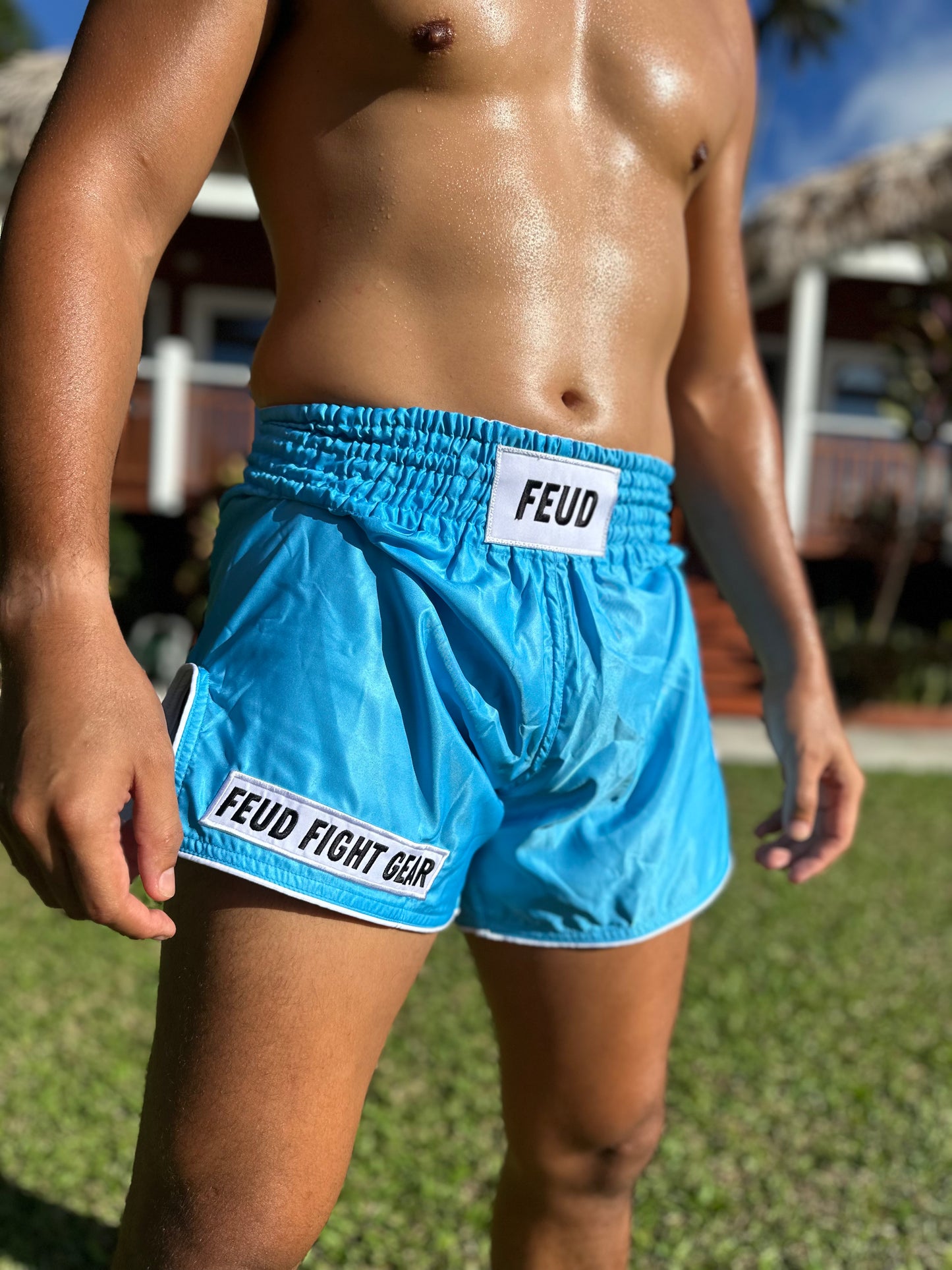 Ocean blue muay shorts in the sun 