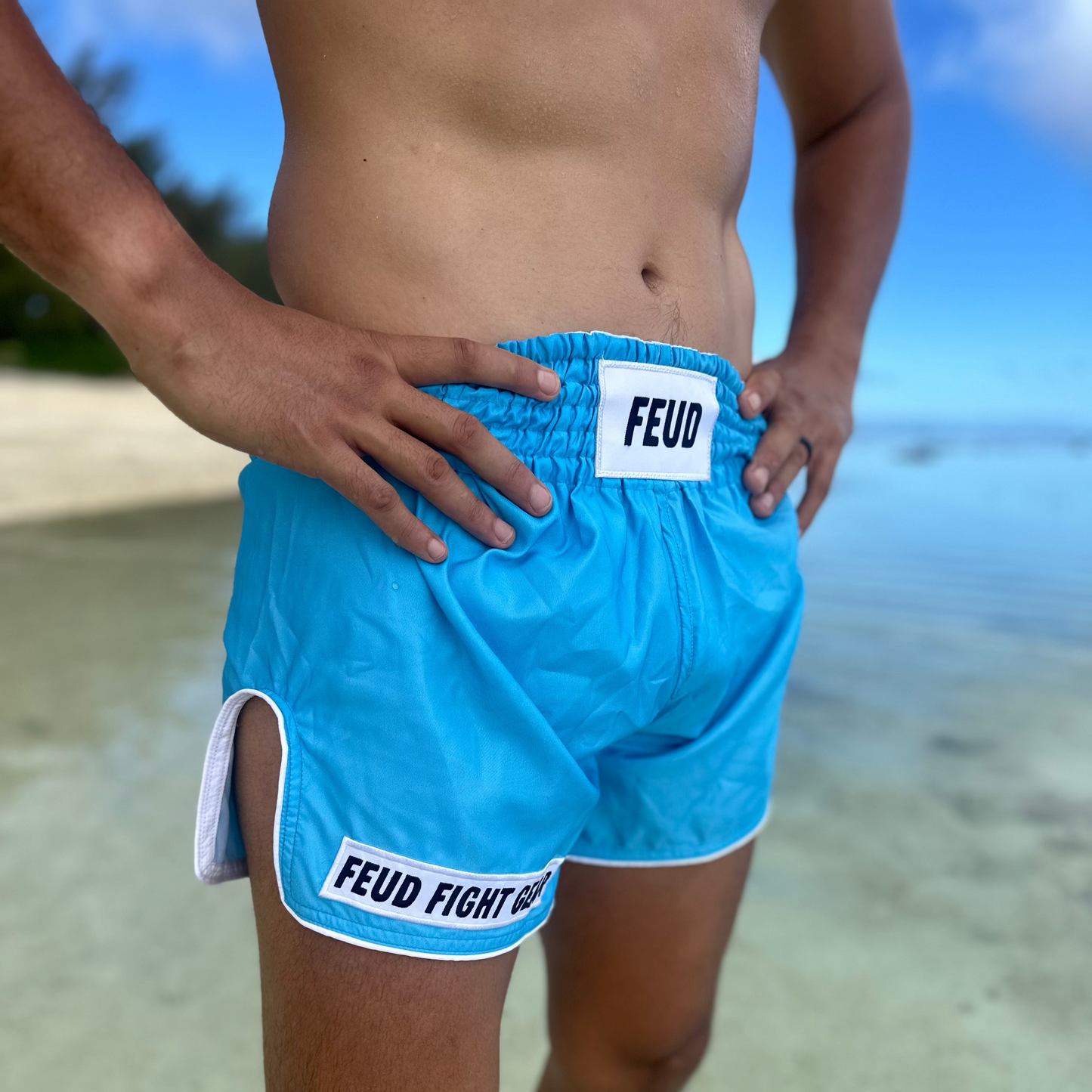 Ocean blue Thai shorts, beach angle. 